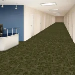 Green patterned fireproof carpet in a modern office hallway.