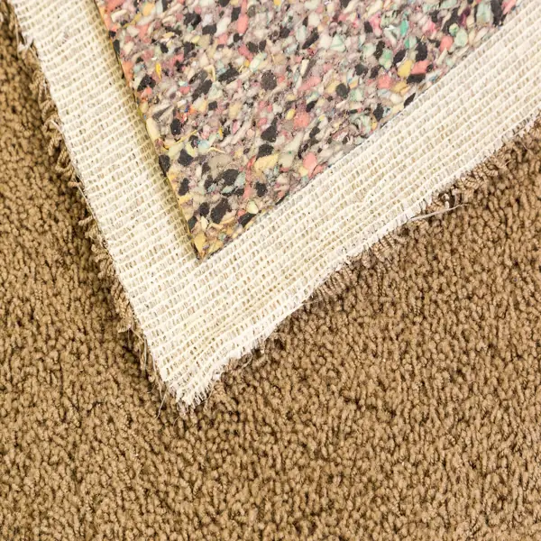 Close-up of carpet padding and woven backing