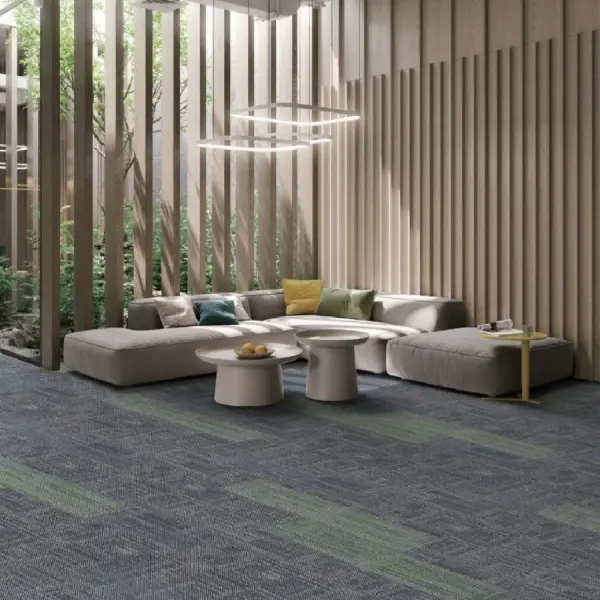 Gray and green textured carpet tiles in a lounge